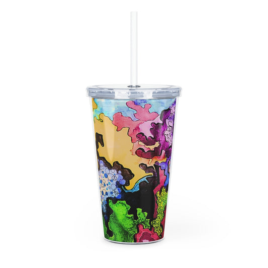 Colorful tumbler with a straw on a white background