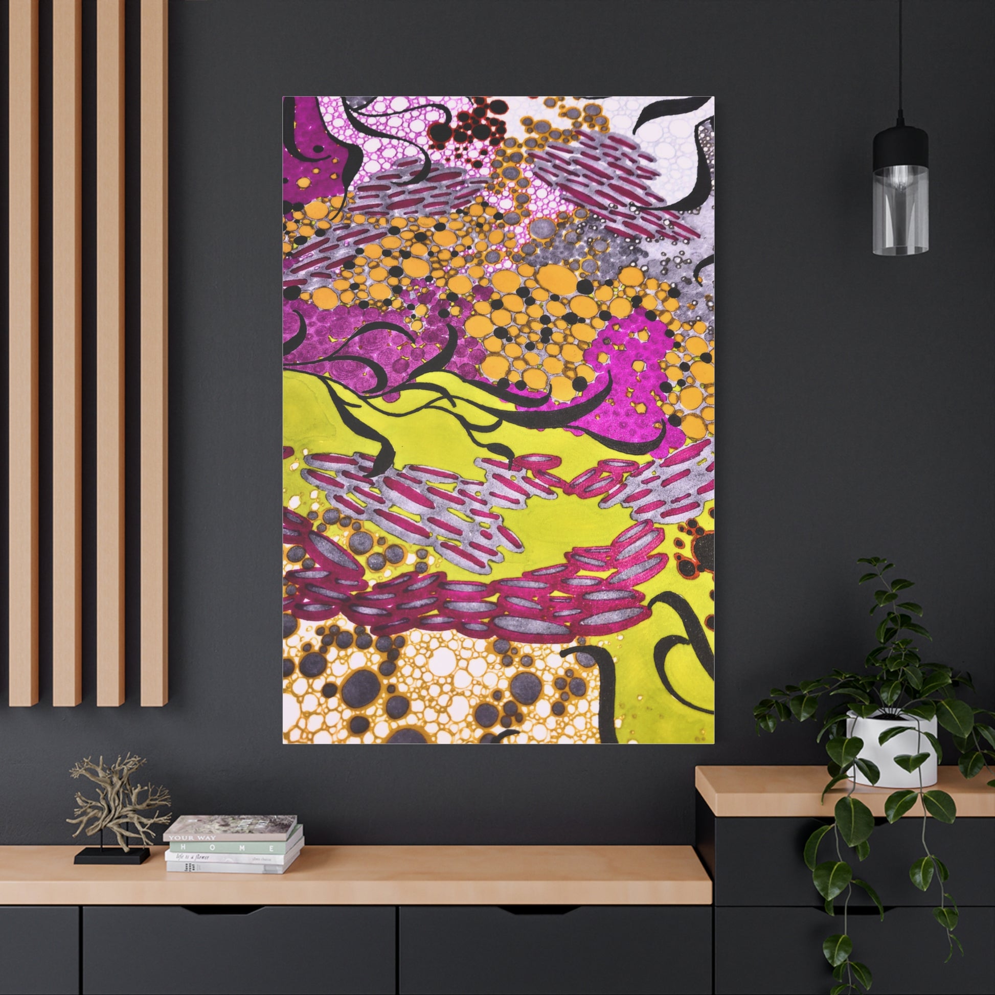 Abstract colorful artwork on a black wall with wooden shelves and plants.