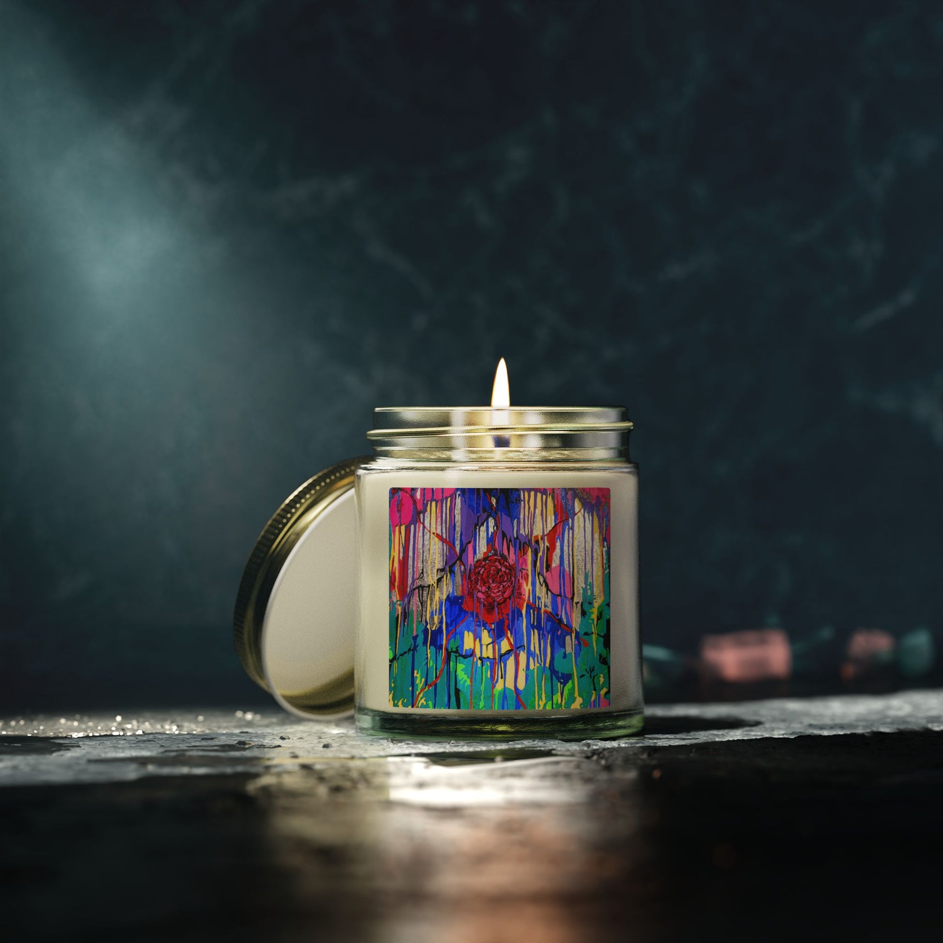 Candle in a jar with a colorful label on a dark background