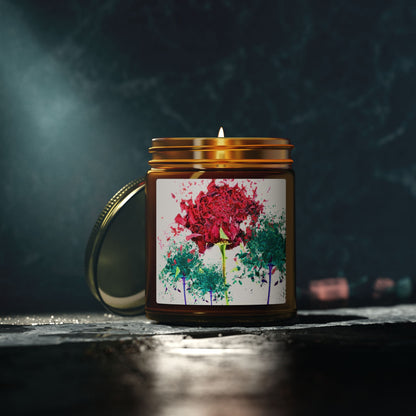 Candle in a jar with a colorful flower design on a dark background