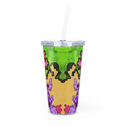 Colorful patterned tumbler with a straw on a white background