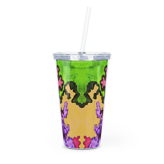 Colorful patterned tumbler with a straw on a white background