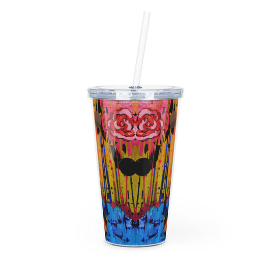 Colorful tumbler with a design featuring roses and abstract patterns on a white background.