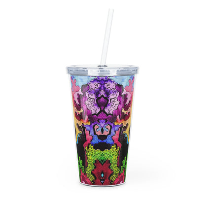 Colorful abstract design tumbler with a straw on a white background
