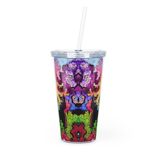 Colorful abstract design tumbler with a straw on a white background
