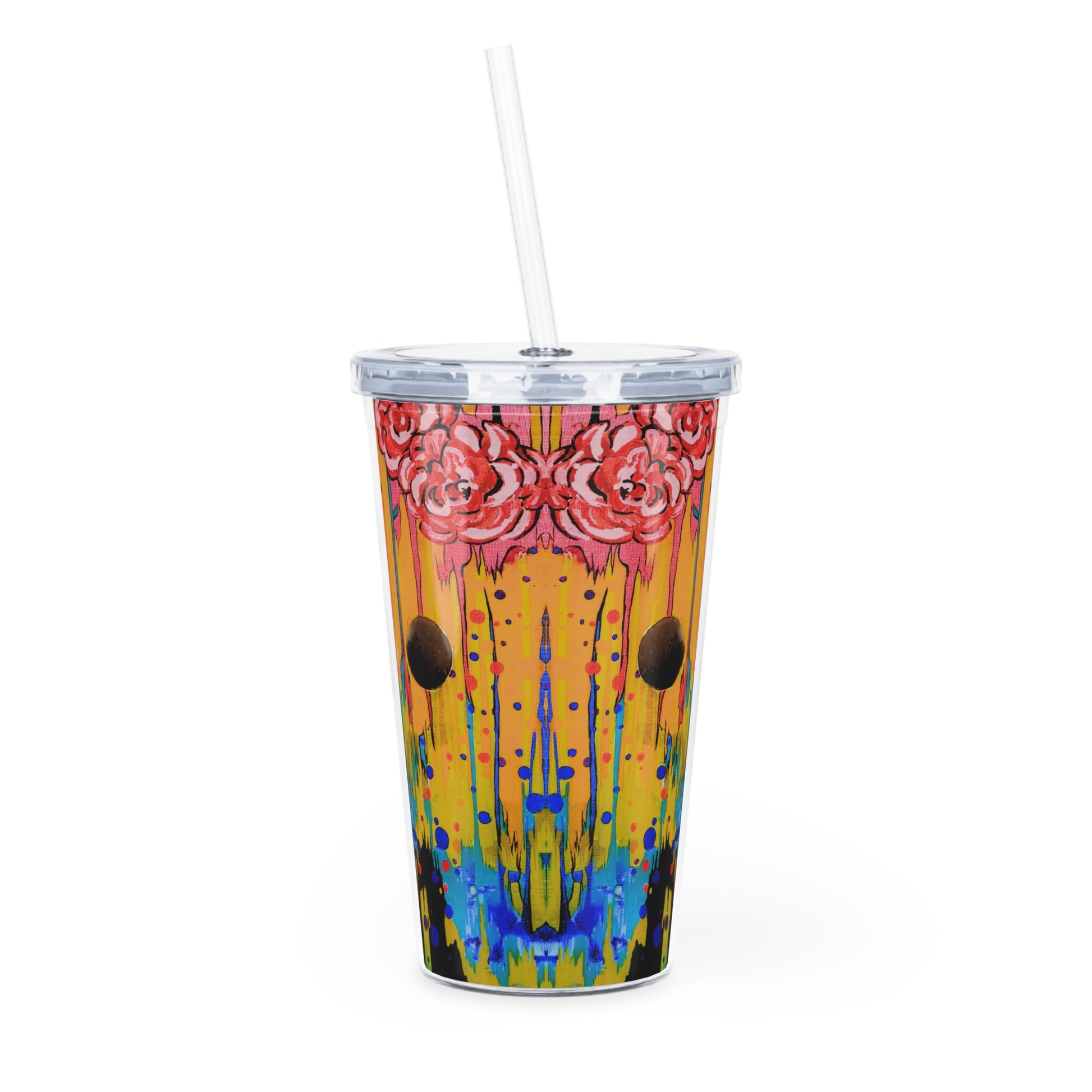 Colorful tumbler with floral design and straw on a white background