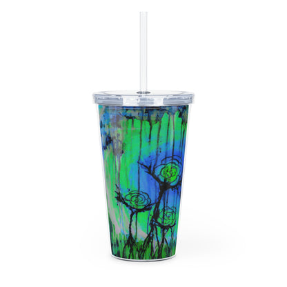 Tumbler with a colorful design of trees and flowers on a white background