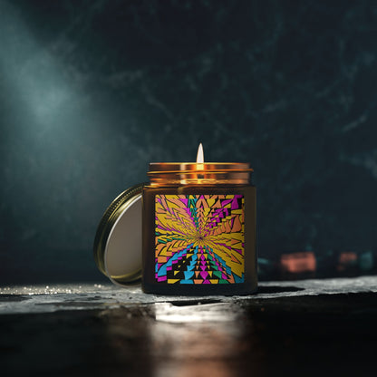 Candle in a decorative container with a colorful design on a dark background