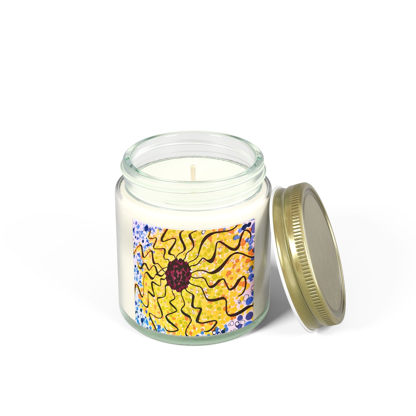 Candle in a glass jar with a sunflower design on the label, on a white background