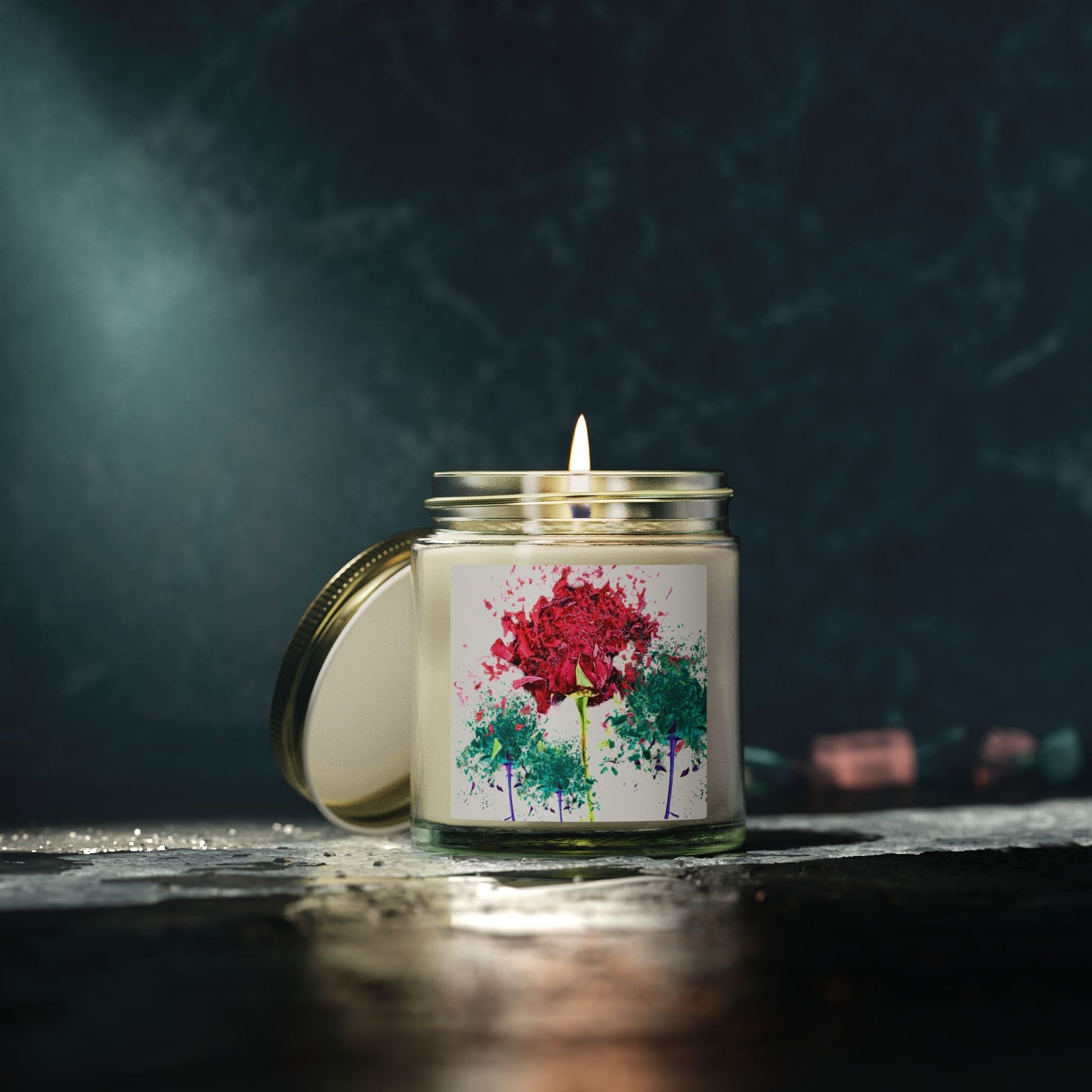 Candle in a glass jar with a floral label on a dark background