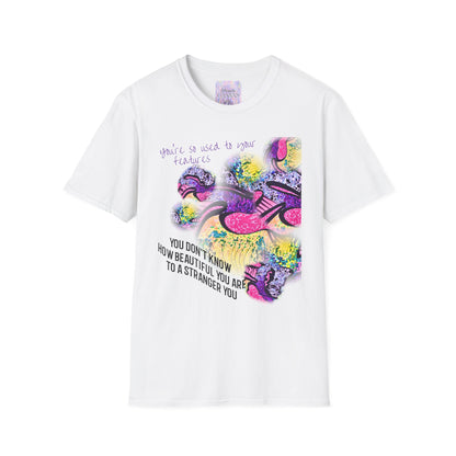 White t-shirt with colorful graphic design and text on a white background