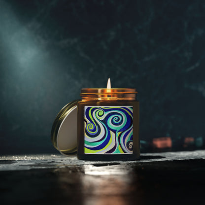 Candle in a decorative jar with a colorful spiral design on a dark background
