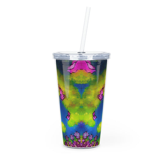 Colorful tie-dye tumbler with pink butterfly design on a white background