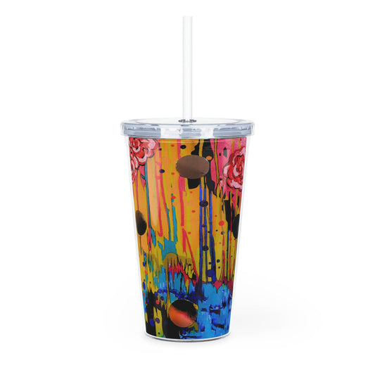 Colorful tumbler with abstract design on a white background