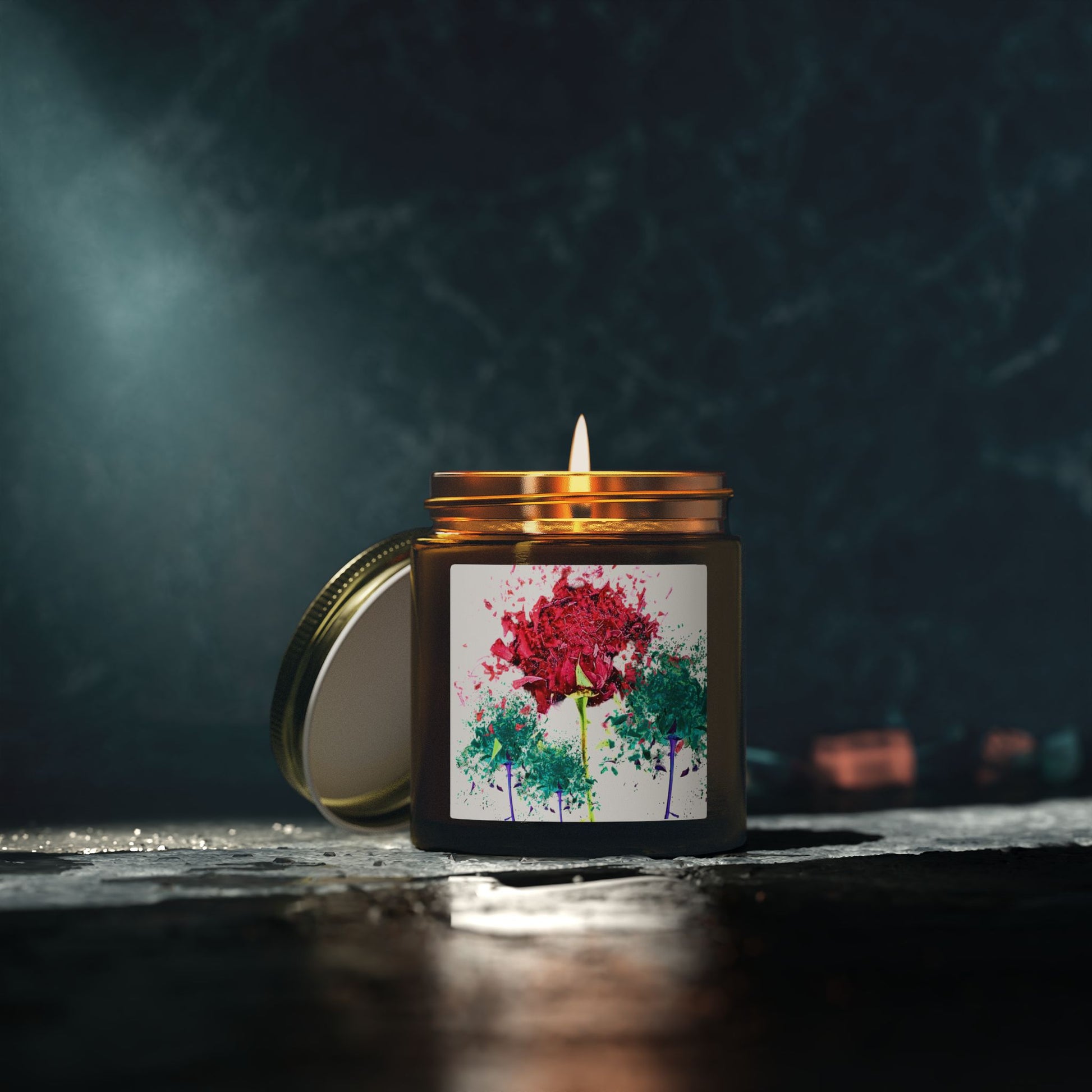 Candle in a jar with a floral label on a dark background