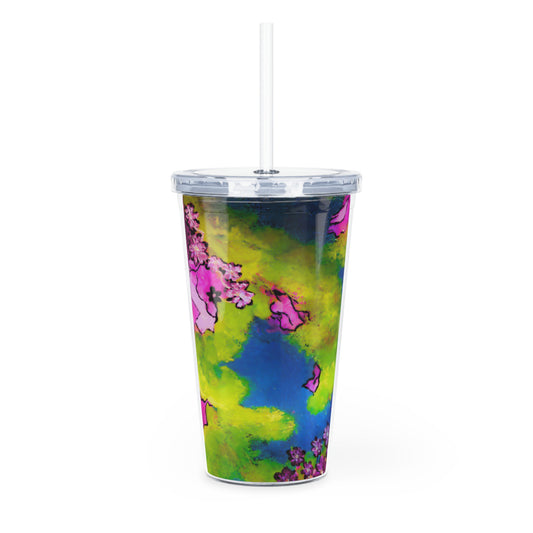 Colorful tumbler with a floral pattern on a white background