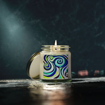 Candle with a colorful label on a dark background