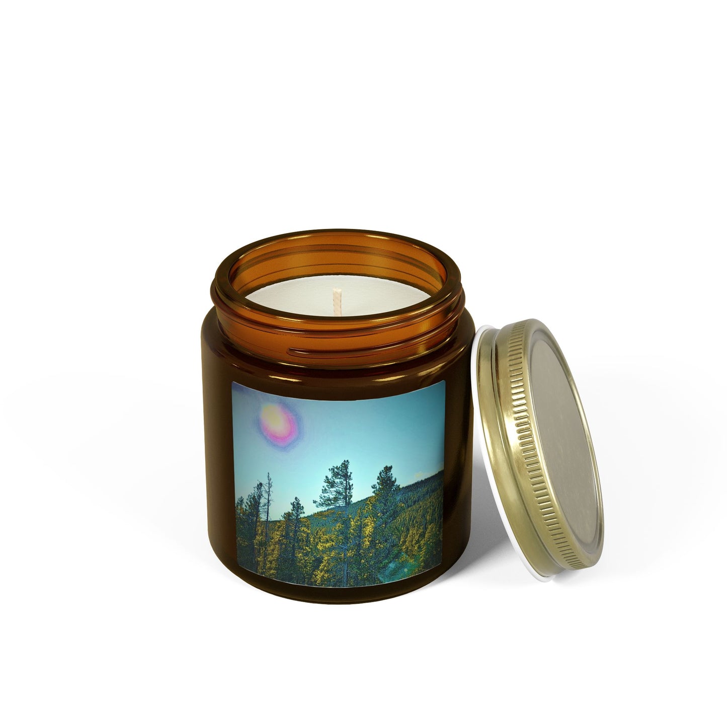 Candle in an amber jar with a scenic label on a white background