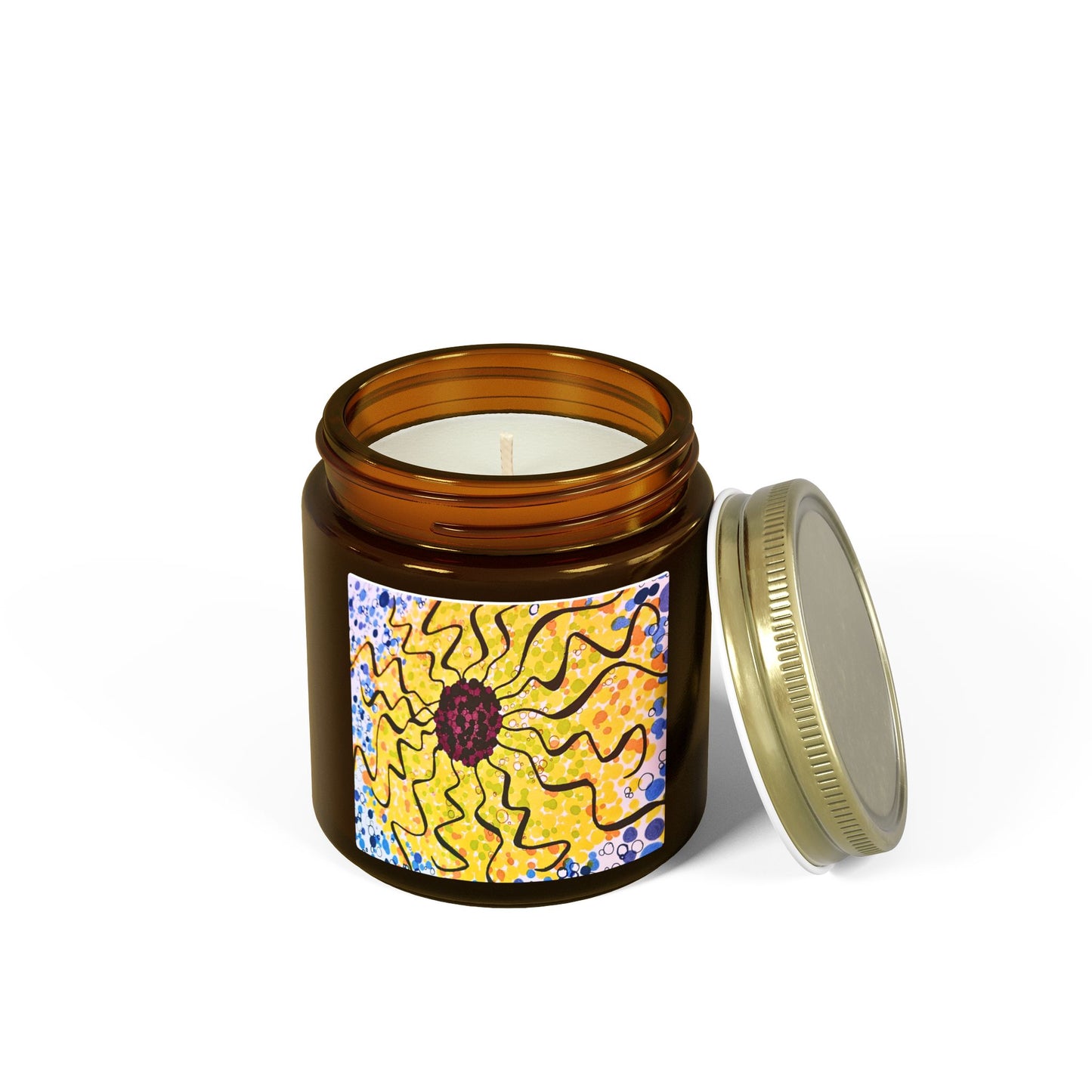 Candle in an amber jar with a colorful label on a white background